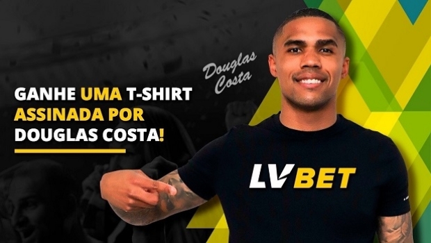 Douglas Costa holds draw of autographed Brazil jersey for LV BET